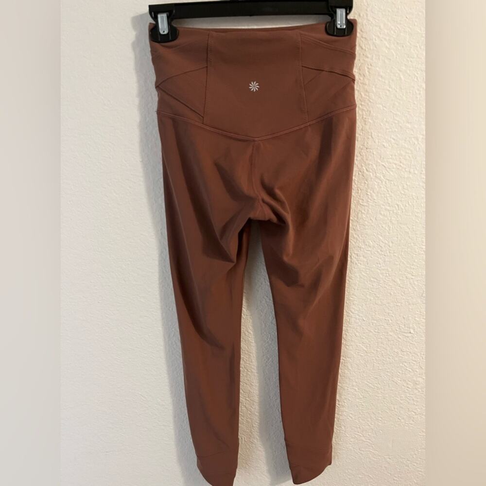 Athleta Elation Pirouette 7/8 Leggings XS Brown Criss Cross Hem High Rise Yoga - Picture 5 of 14